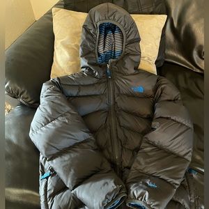 The north face reversible puffer parka size youth extra-large.
